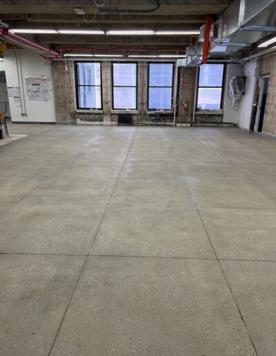 Spacious commercial interior with polished concrete flooring